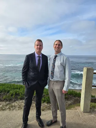 Jereme with his brother Andrew at an ocean overlook in La Jolla